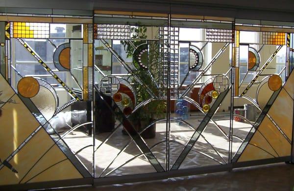 These are automatic stained glass doors prove I think outside the box