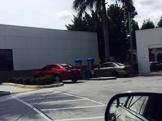 One of the many reasons I hate MIAMI. Two cars parked in the air & water space, none of them getting air or water.