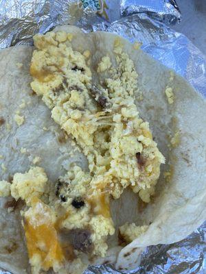 A scrambled egg burrito with a couple slivers of meat.... Hella disappointing