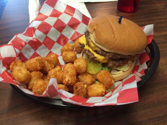 Double cheese burger with tots.