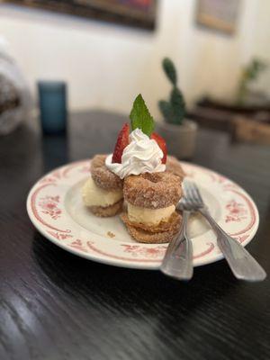 OMG this is so good.  Churro doughnuts with vanilla ice cream sandwiches