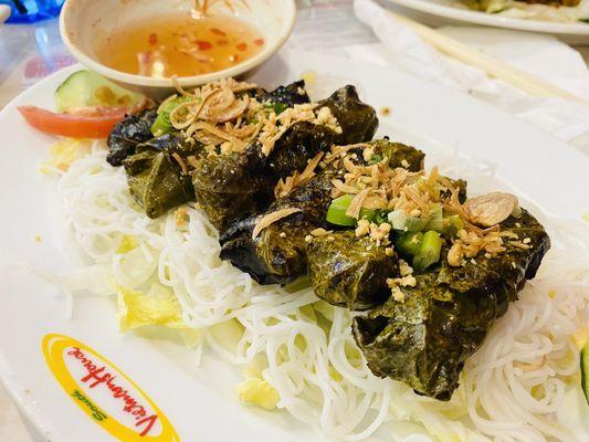 A7. Grill Beef Wrapped in Grape Leaves served under vermicelli noodles