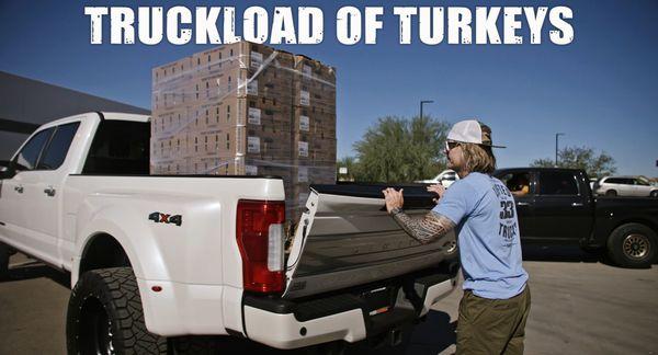 Delivering a truckload of turkeys to a local food bank before Thanksgiving.