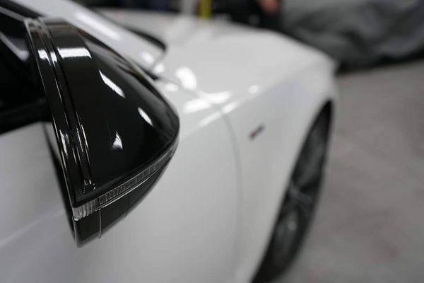 Side Mirrors wrapped in Gloss Black for Style added PPF for Protection.