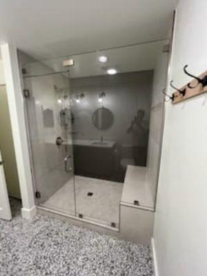 Demoed old shower and small closet. Converted space into this beautiful shower. Awesome!