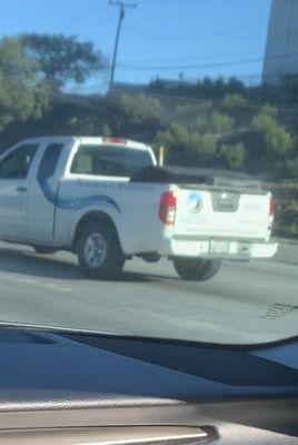 Nissan company truck on the 405 at 9am driving reckless