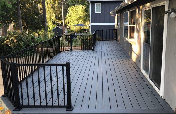 Trex "Enhance Basics" collection "Clam Shell" color with Timbertech "Impression Rail Express" aluminum railings.