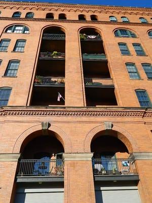 Some of the apartments in this historic landmark have balconies.