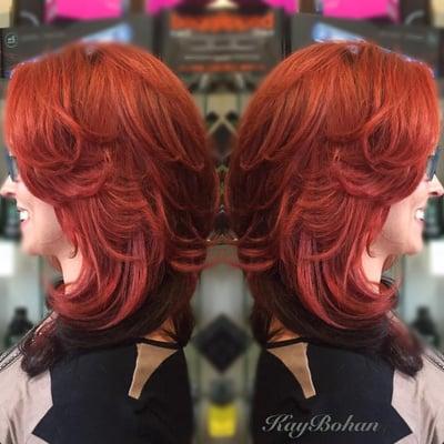 We are here to transform hair! From a dull blonde to this fiery red! We love Block Coloring with Paul Mitchell Color!