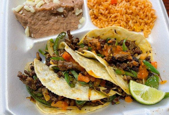 Tacos Valentes a la Mexicana.  These are great steak sautéed on flattop  with jalapeños, onions and tomatoes.