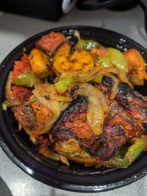 Tandoori mix featuring shrimp and chicken.