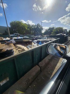 Driver's view in dumping area. Different bins for different things.