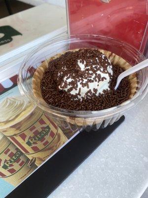 My husband's waffle cone in a bowl with chocolate sprinkles