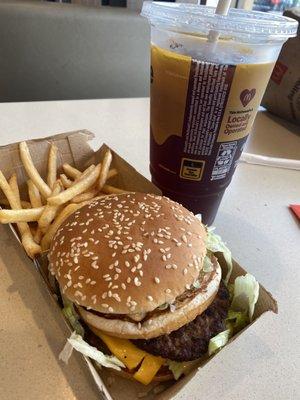 Burnt burger meat, cold fries, and dark-as-sin "iced" tea.