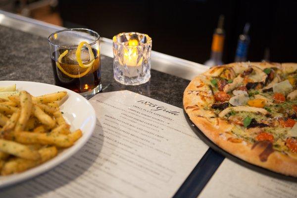 Craft cocktails, hand tossed pizzas