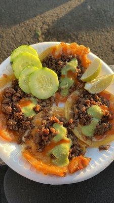 Tacos with melted cheese (quesa taco) with hot sauce & guac sauce