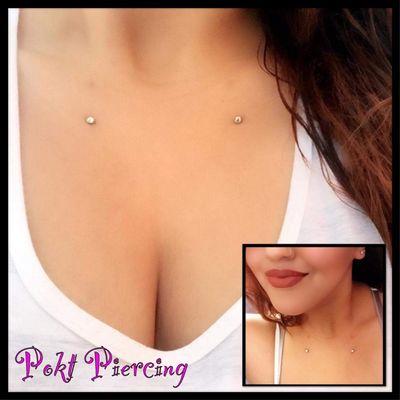 Healed Dermals on the clavicle/chest. Implant grade jewelry with CZ clear/gem clear ends.