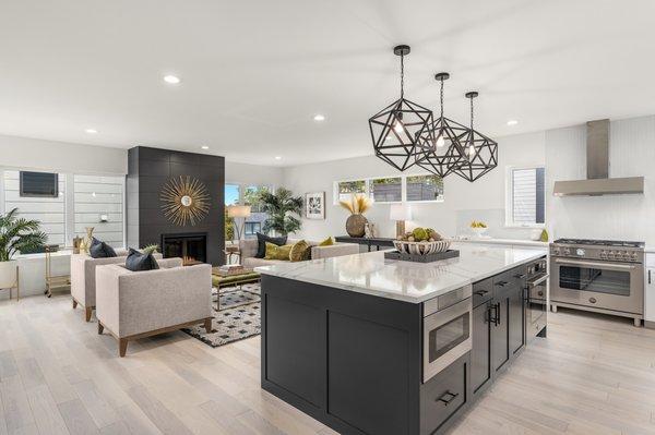 Wide plank, white ash hardwood flooring throughout the home.