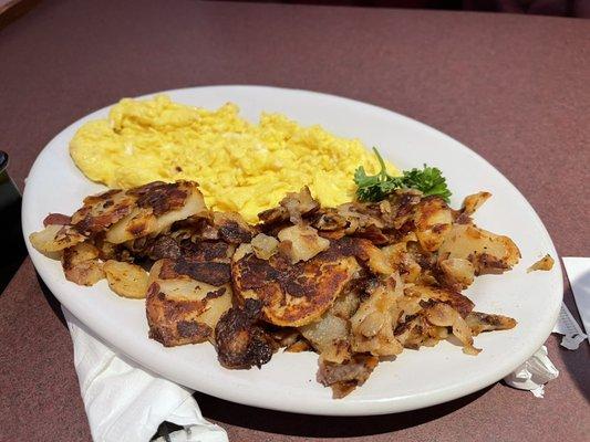 Breakfast potatoes and scrambled eggs