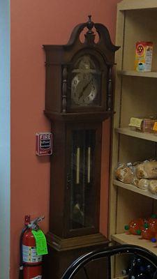 Grandfather clock just chillin' on the corner