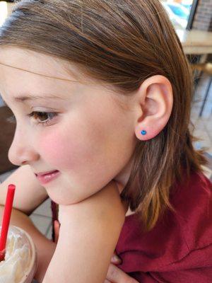 8-year-old with her first piercings. She loves them!