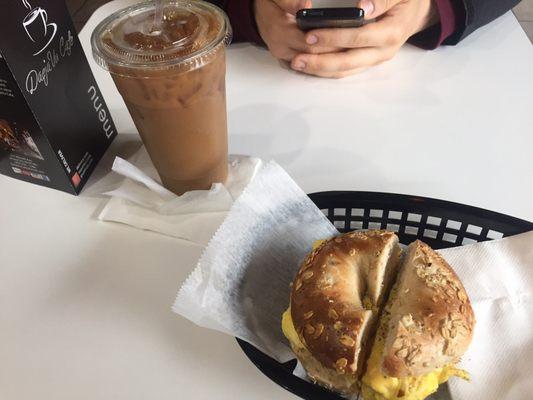 Energy bagel toasted with egg and cheese. Inexpensive iced coffee :)