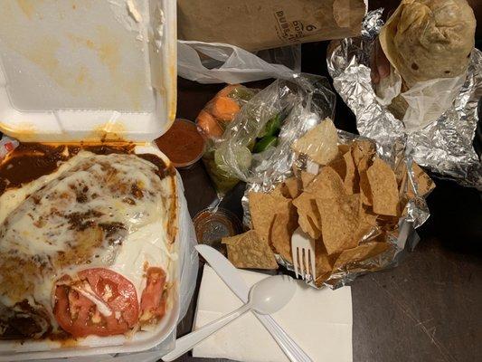 Shrimp wet burrito, pastor burrito, chips, salsa, pickled carrots and jalapeños with limes