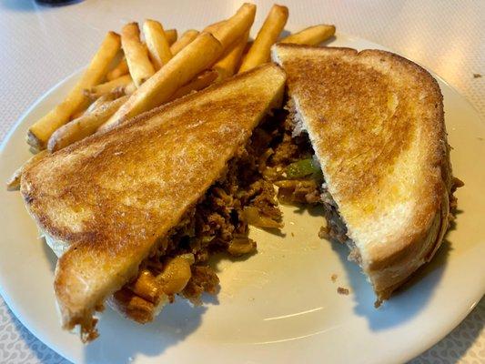 My pedestrian Smothered Philly Cheesesteak. The sandwich was alright, but the center of the bread was not crispy whatsoever.