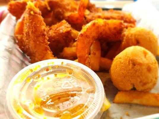 Coconut shrimp with hushpuppies.