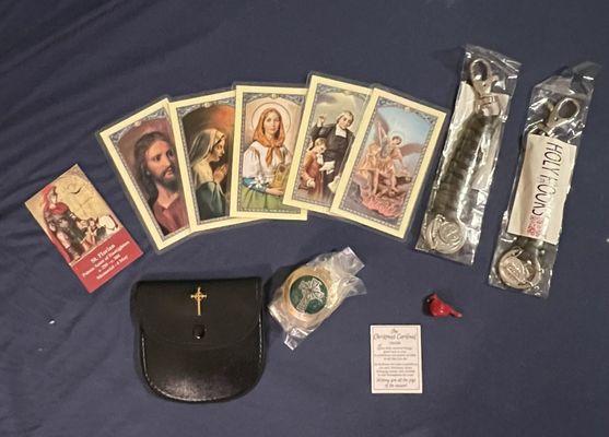 prayer cards, Holy Hooks key chains, case and holder for Eucharistic minister, and a charm with the explanation card.