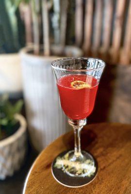 The Gardener's Daughter: Roku Japanese gin, raw organic beets, cold pressed lemon, chili, topped w/ sparkling