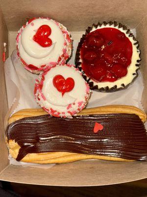 Vanilla Valentines cupcakes, strawberry cheesecake, and Eclair.