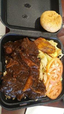 Medium oxtail. Comes with the rice and veggies, I added tomatoes,  fried dumpling and plantains + bottle of water, total $11.75. Not bad!