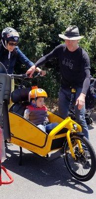 Helping a family test ride the new Bullitt e-cargo bike at Sunday Streets.