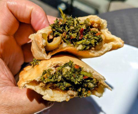 Beef empanadas with chimichurri.