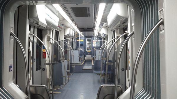 This is the typical interior of a light rail car on the blue and green lines.