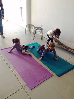 Little yogis having some mat playtime at our Grand Opening Party 10.18.15