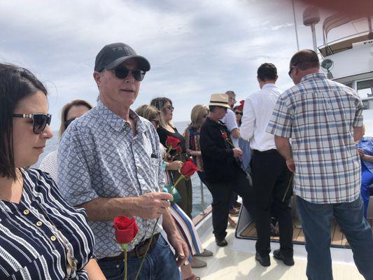 On the bow of the boat after receiving our roses.