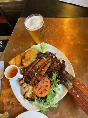 Churrasco platter, which has absolutely amazing flavors.  Support your local restaurants and the families behind them.