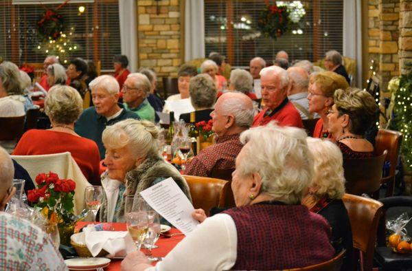 Singing carols at the Resident Christmas Party