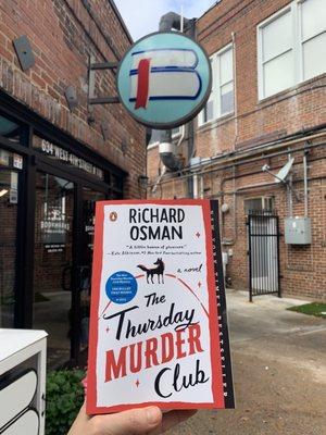 The Thursday murder club in front of bookmarks