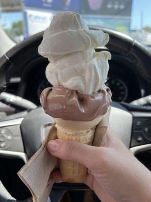 Medium vanilla and chocolate frozen custard cone.  Huge portions!