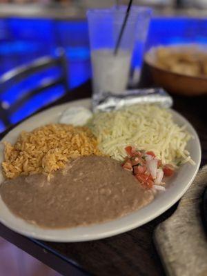 Rice,refried beans, pico de gallo and cheese