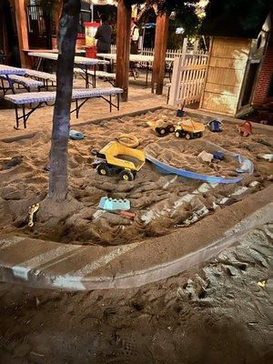 Large sandbox for digging up fossils- also a popular spot