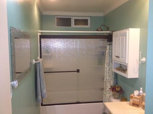 Sliding Glass Tub Enclosure. Rain Glass w/ Oil Rubbed Bronze Hardware.