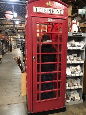 Inside the store, old phone booth