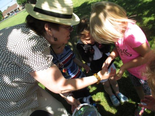 Mrs. Gahr releases butterflies with her friends.