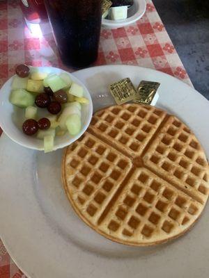 A fruit bowl and a waffle