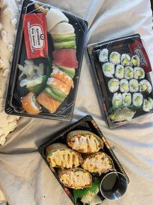 Tempura Rainbow Roll, Tasty Inari Roll (I already ate one lol) half tuna half imitation crab, and an Avocado Roll.