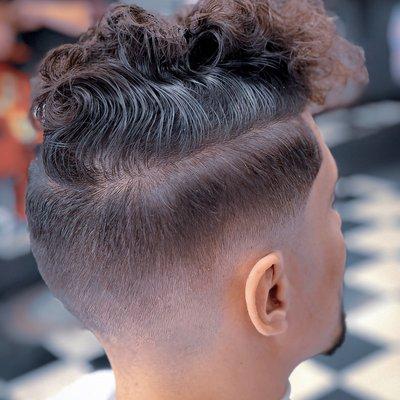 Undercut mid bald fade